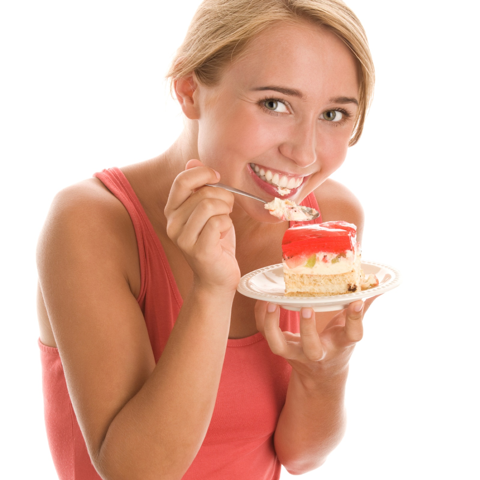 A slice of cake on a plate, enjoying food without guilt as part of a healthy relationship with food