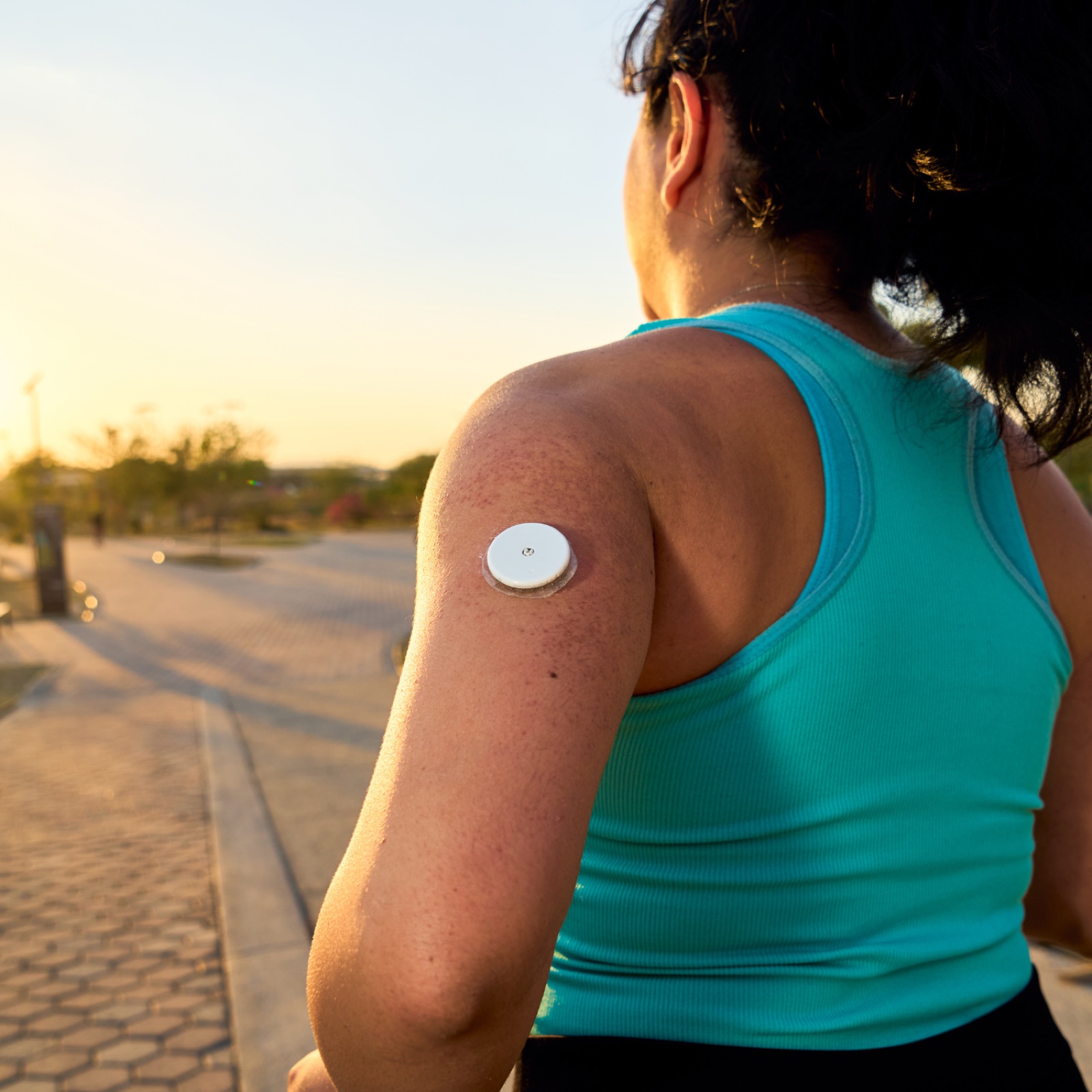 Continuous glucose monitor worn on the arm, tracking the everyday factors that affect blood sugar