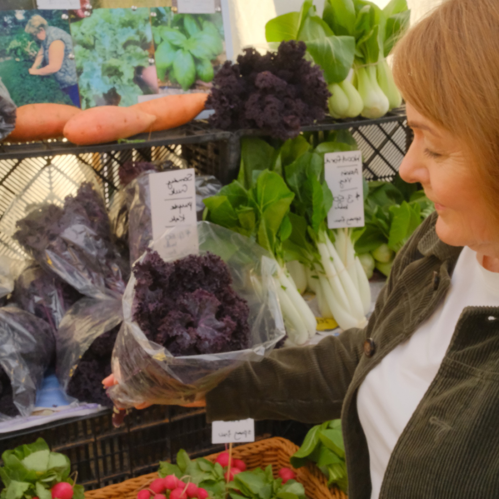 Dorelle Thompson, Brisbane telehealth dietitian, with fresh produce in her clinic